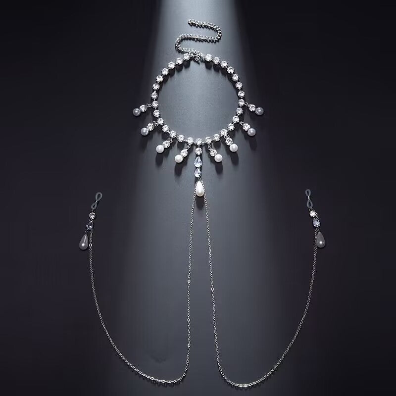 Front view flat lay of silver rhinestone and pearl non-pierced nipple jewelry connected to a choker chain.