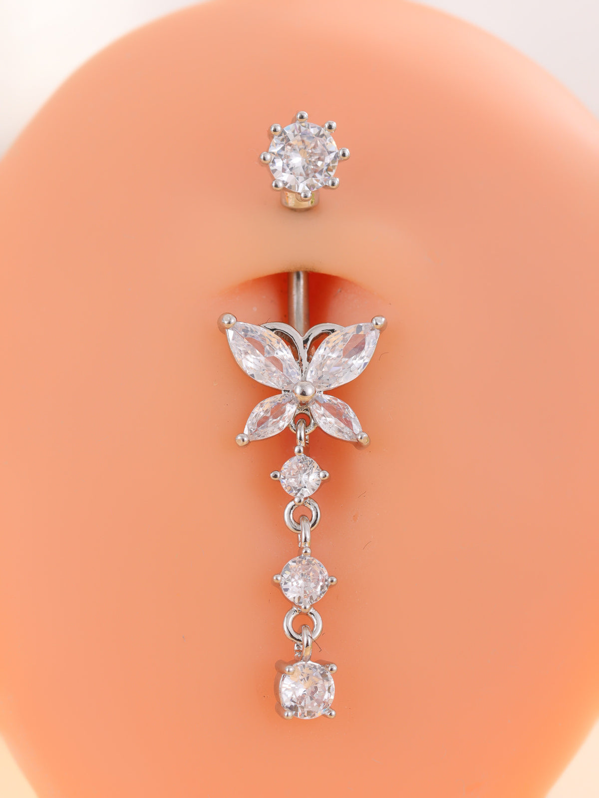 Single silver-tone butterfly navel ring with marquise wings and three dangling stones