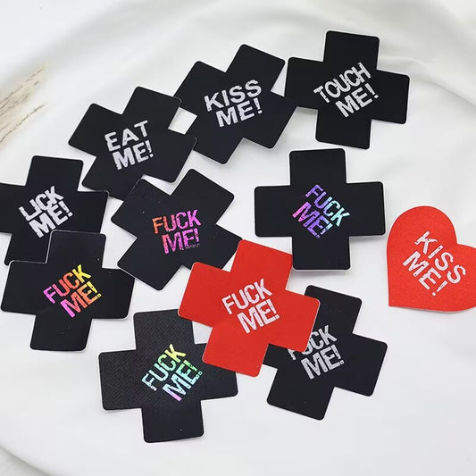 Sassy slogan nipple covers pasties pack featuring cross and heart shapes with Kiss Me, Touch Me, Eat Me, Lick Me, and Fuck Me prints