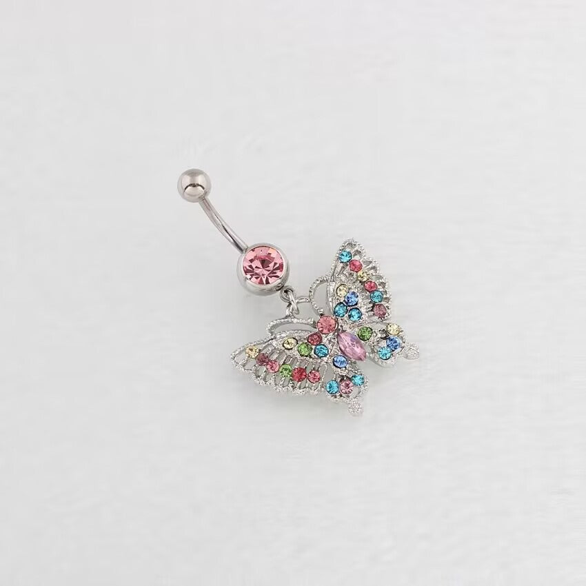 Side view of a sparkling multi-color butterfly dangle navel ring highlighting the curved barbell and top screw ball.