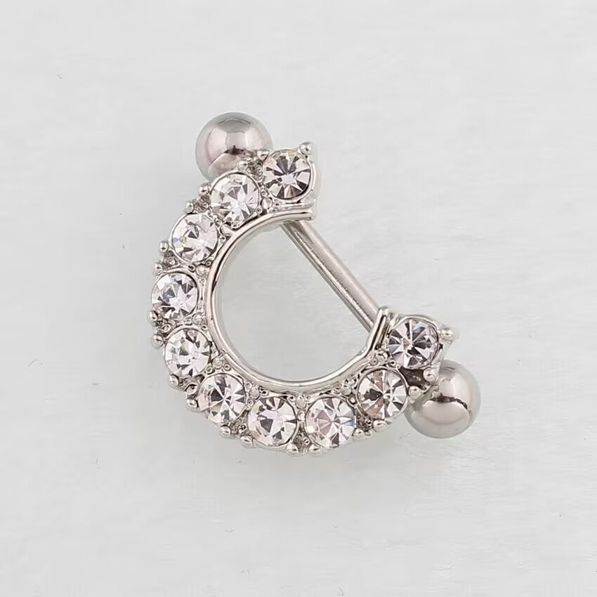 Side angle view of a silver U-shaped nipple shield jewelry with brilliant inlaid crystals on a white background.