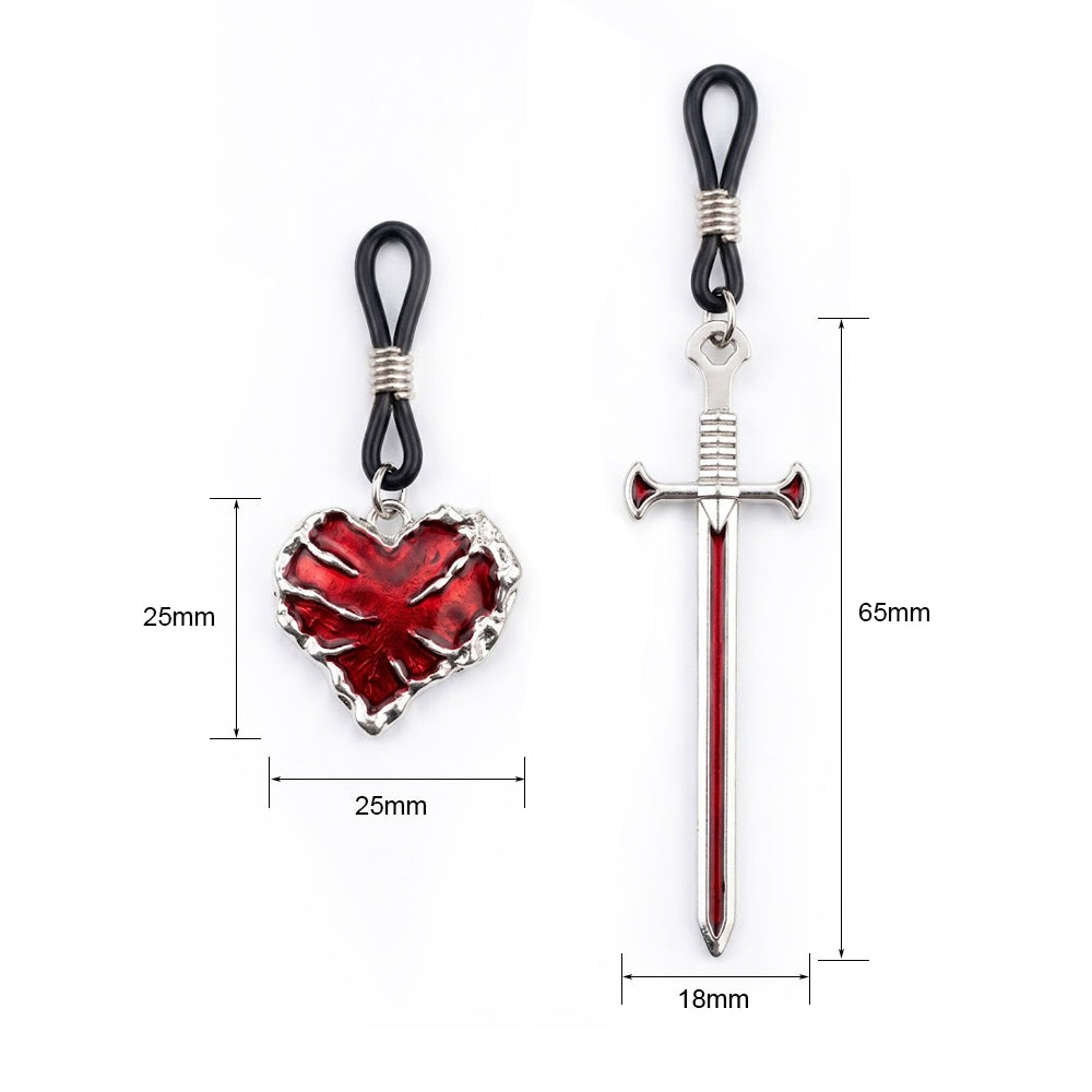 Size chart showing measurements for the non-piercing nipple rings: heart charm is 25mm and the sword charm is 65mm in length.