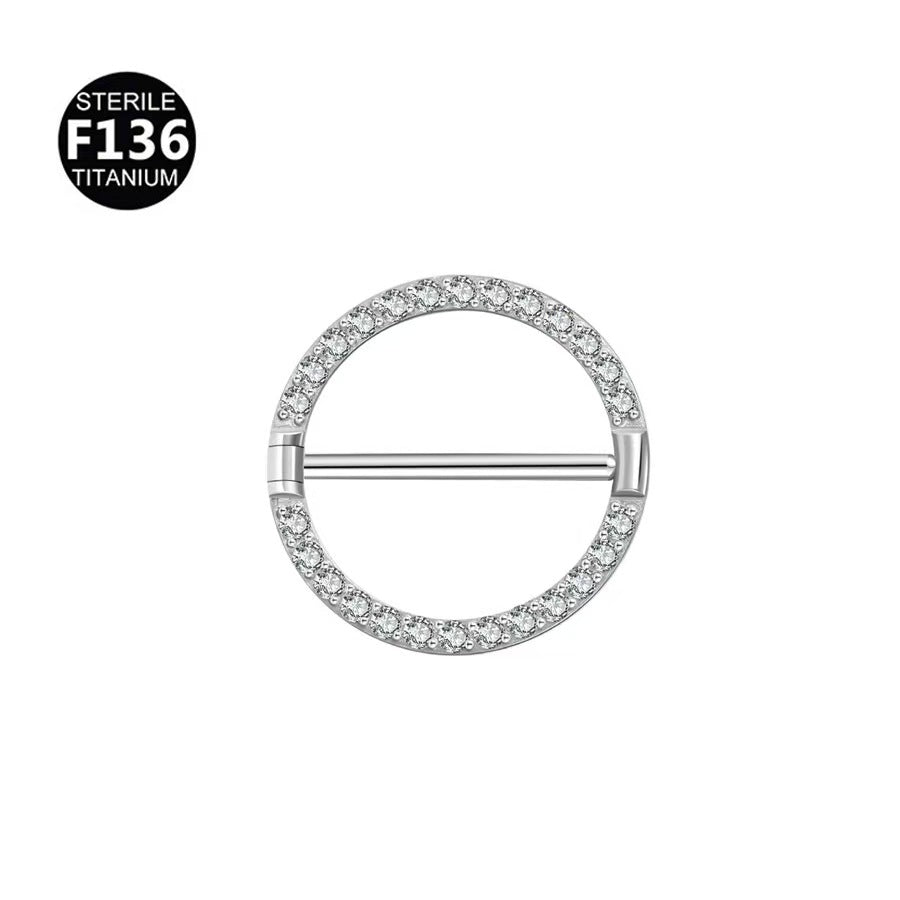 Silver F136 titanium round nipple shield jewelry adorned with a full circle of micro paved brilliant cubic zirconia crystals.