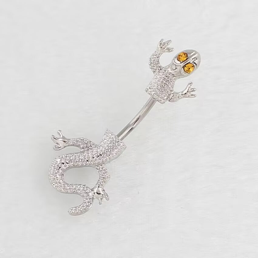 Lizard navel ring with topaz yellow crystal gem eyes.