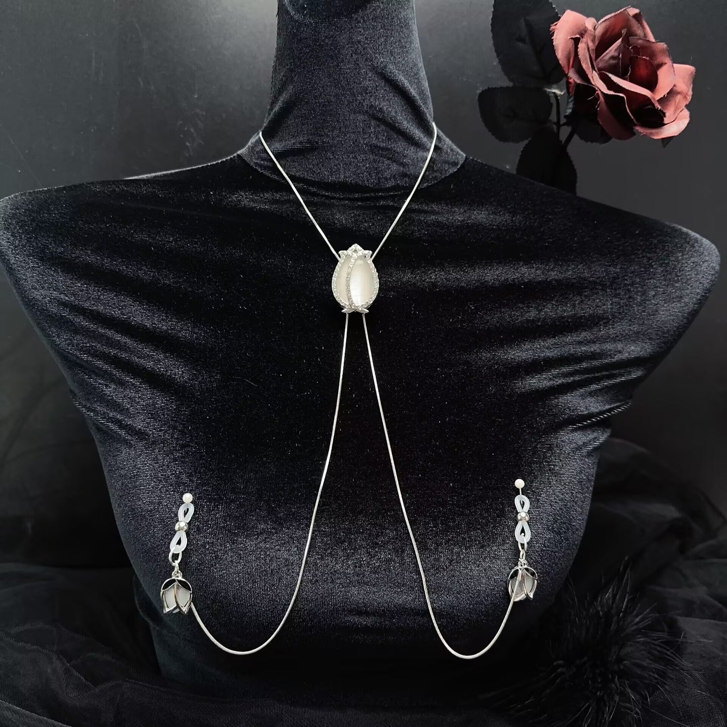 Non-pierced tulip nipple clamp body chain set displayed on a velvet mannequin for sensual lingerie styling.