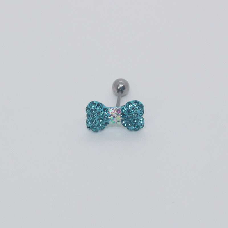 One turquoise rhinestone bow earring with an iridescent center, visible post and silver-tone ball end.