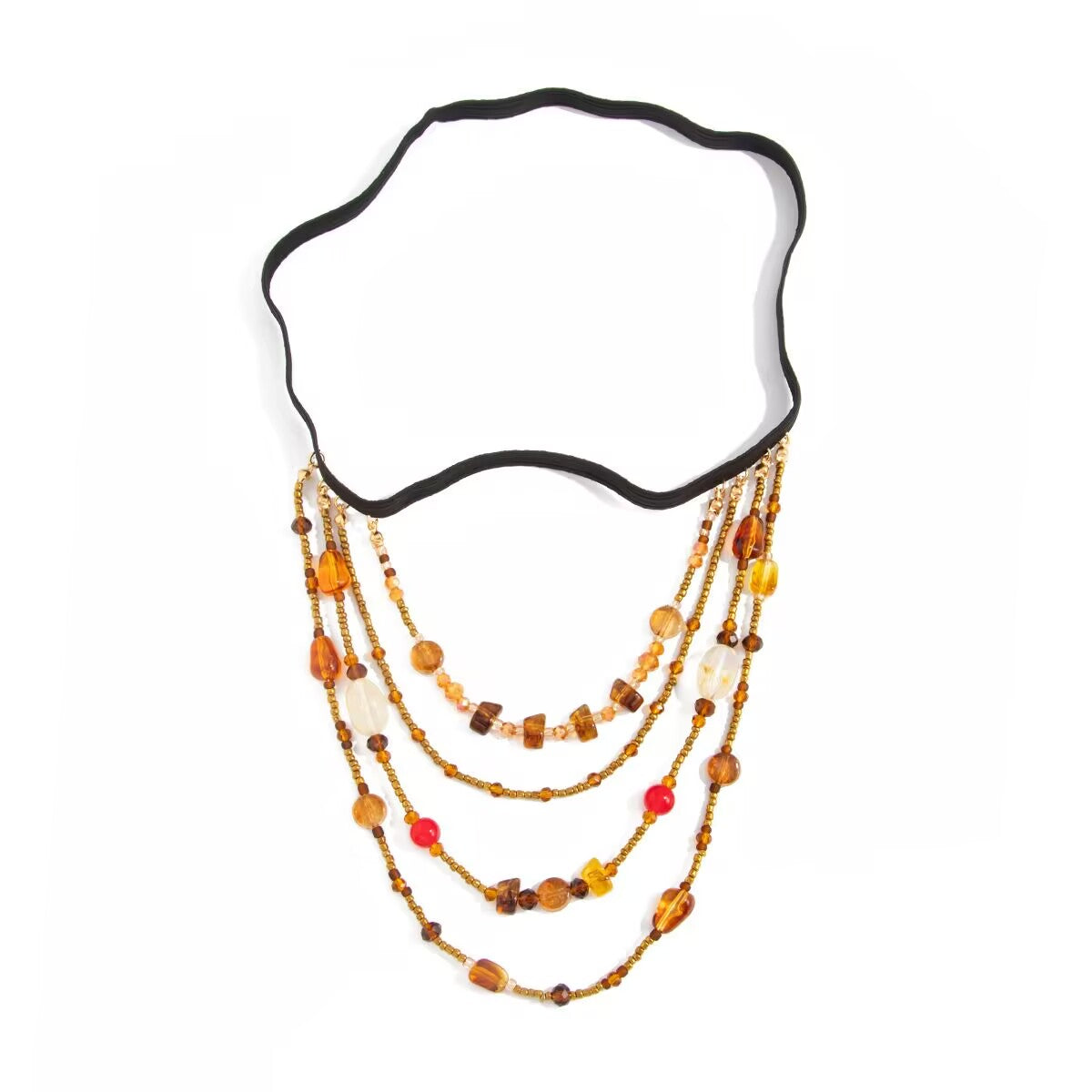 Flat lay product image of a bohemian layered beaded leg chain with black stretch band on white background.
