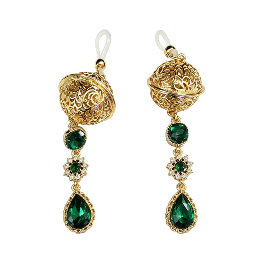 Pair of vintage gold non-pierced nipple jewelry featuring flexible silicone loop attachments and emerald green crystal drops.