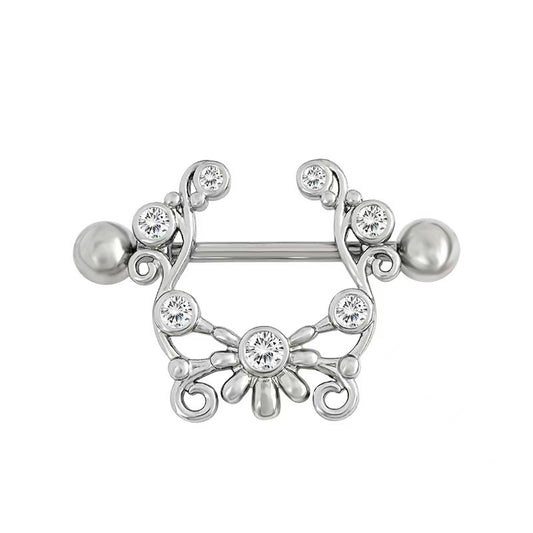 Symmetrical silver filigree nipple shield with sparkling crystal accents.