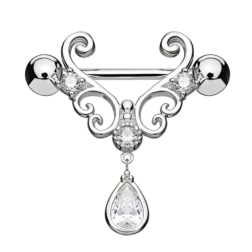 Front view of a polished silver vintage filigree nipple shield with a central crystal and clear teardrop dangle.