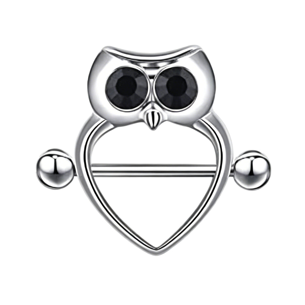 Front view of a single silver-colored heart-shaped nipple shield ring featuring a vintage owl design with black gemstone eyes on a pure white background.