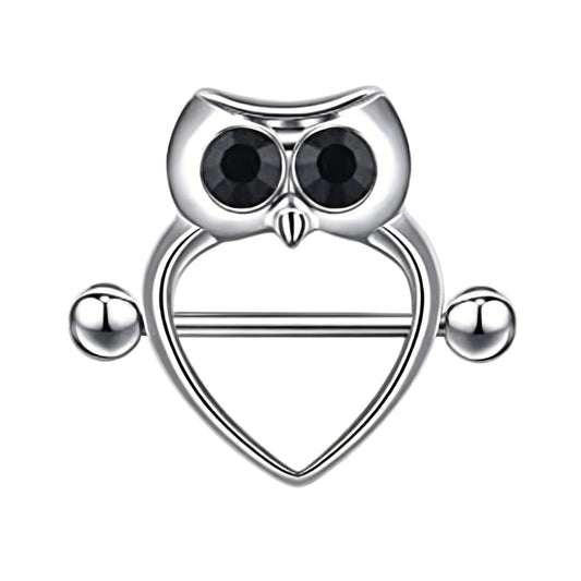 Front view of a single silver-colored heart-shaped nipple shield ring featuring a vintage owl design with black gemstone eyes on a pure white background.