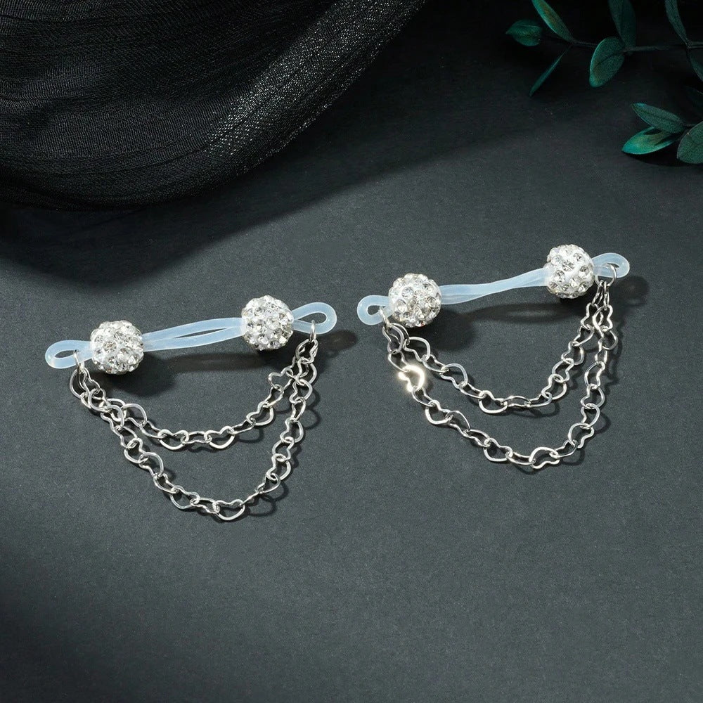 Pair of white sparkling-ball non-piercing nipple jewelry with translucent loops and silver-tone heart chains