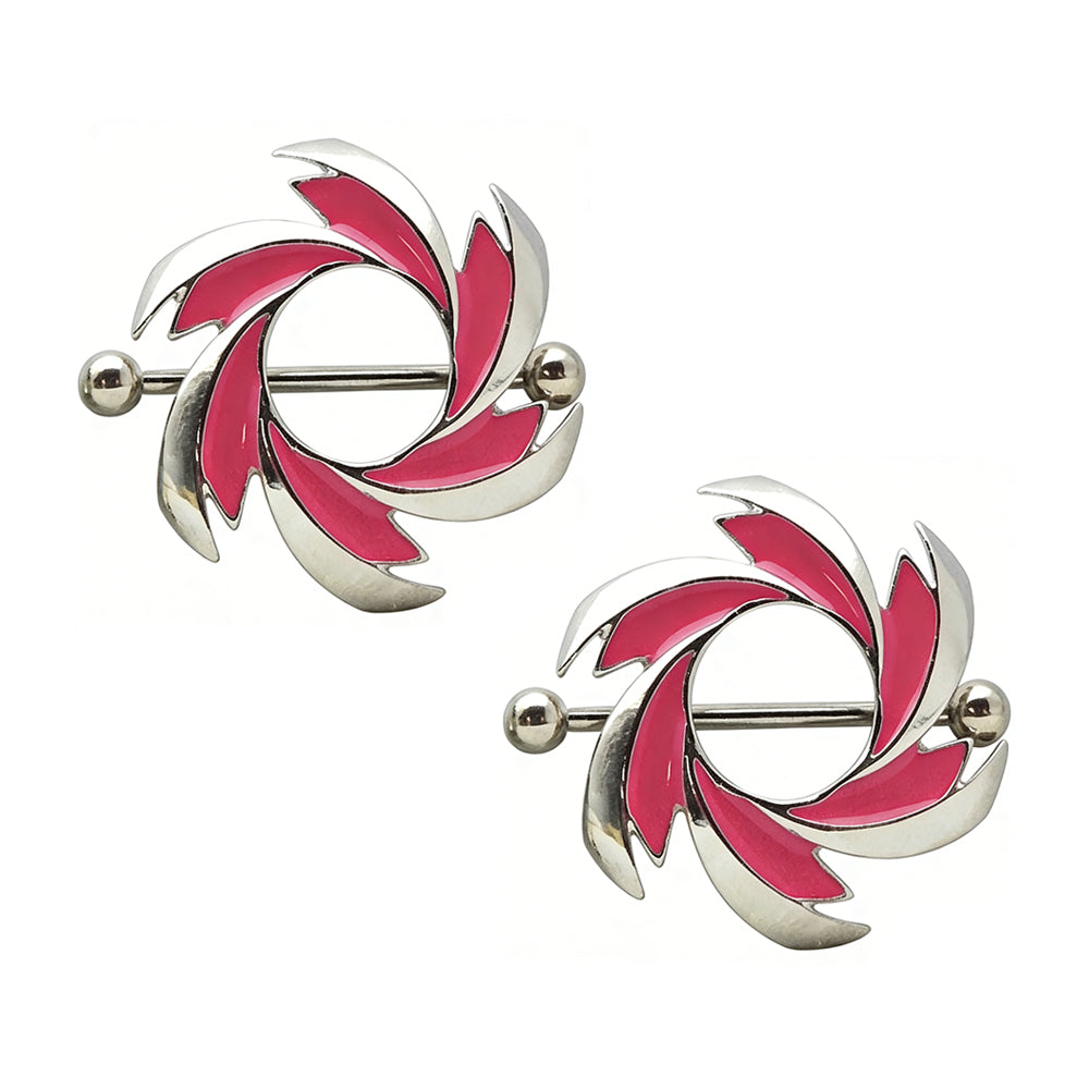 A pair of pink flame swirl nipple shields for alternative body piercing styling.